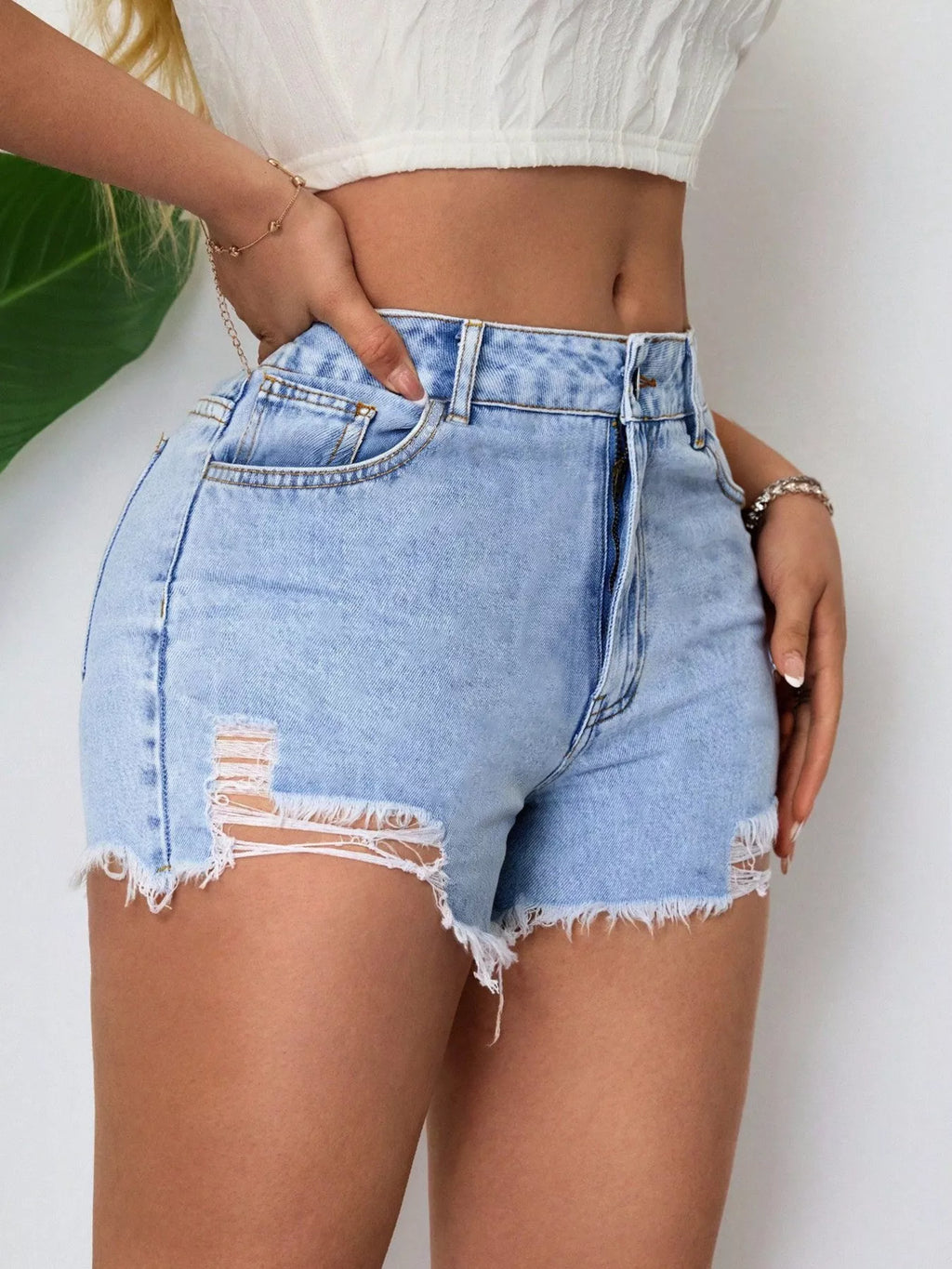 Light Wash Distressed Raw Hem Denim Shorts