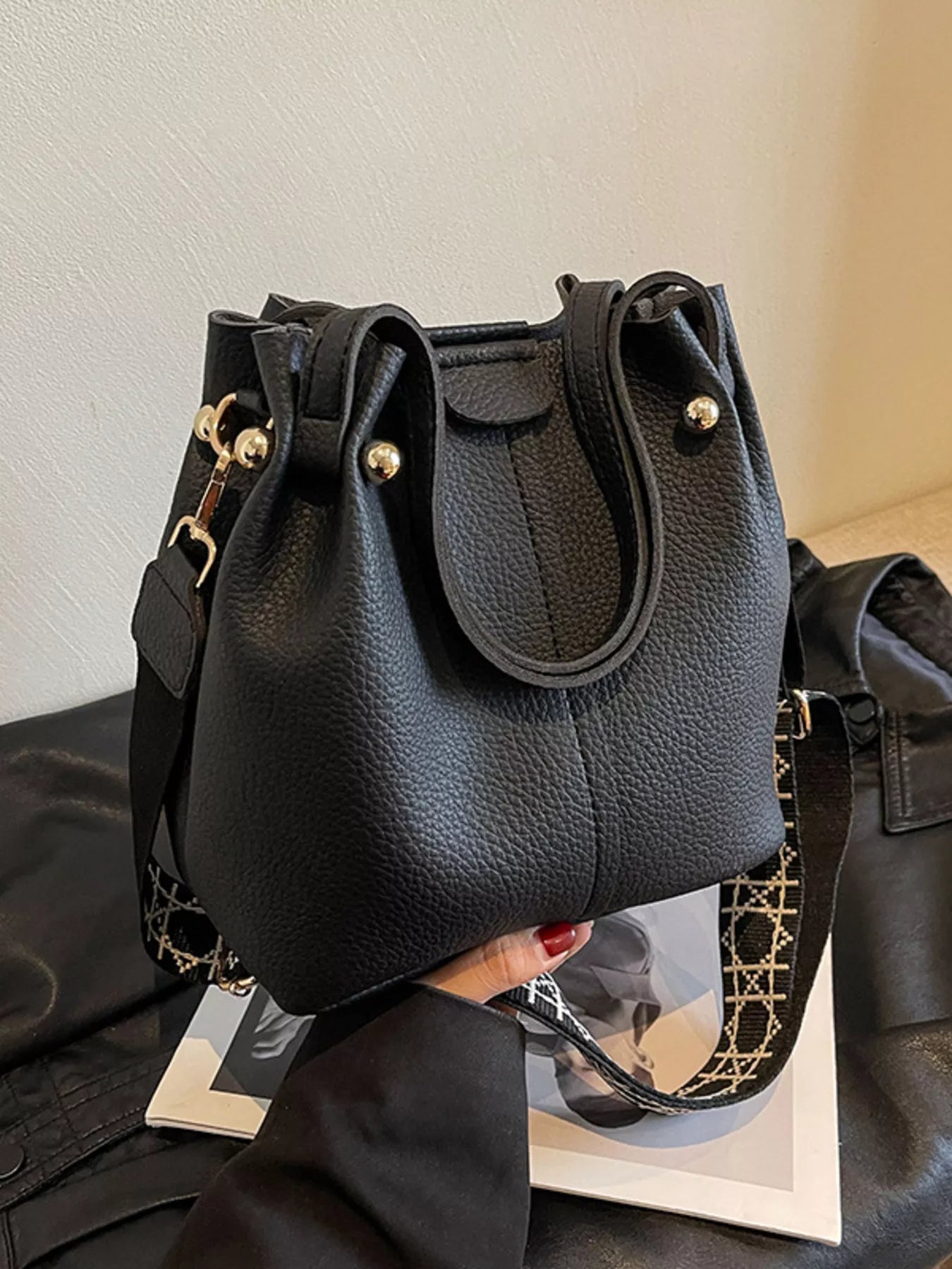 Black PU Leather Bucket Crossbody Bag with Patterned Strap