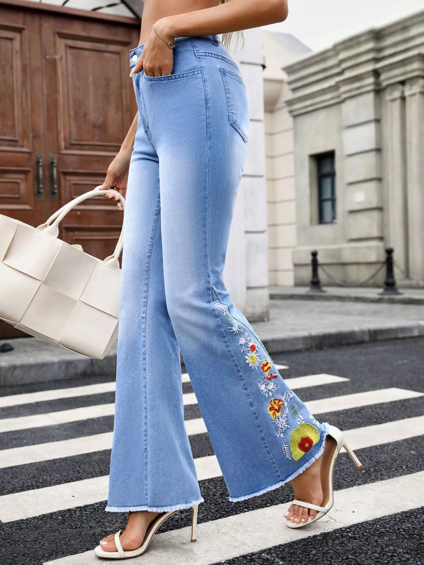 Floral Embroidered Flare Jeans with Raw Hem Detail