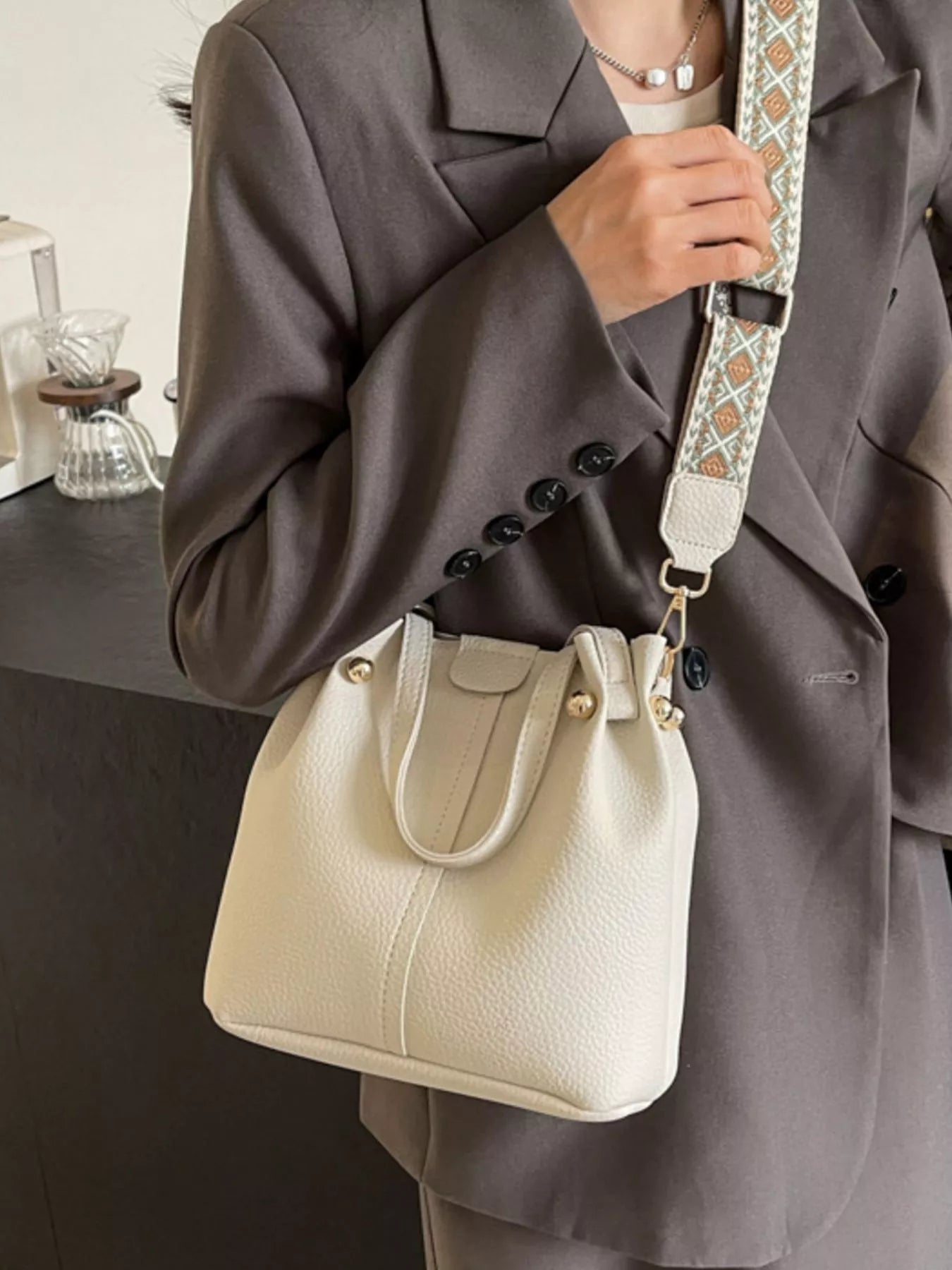 Black PU Leather Bucket Crossbody Bag with Patterned Strap