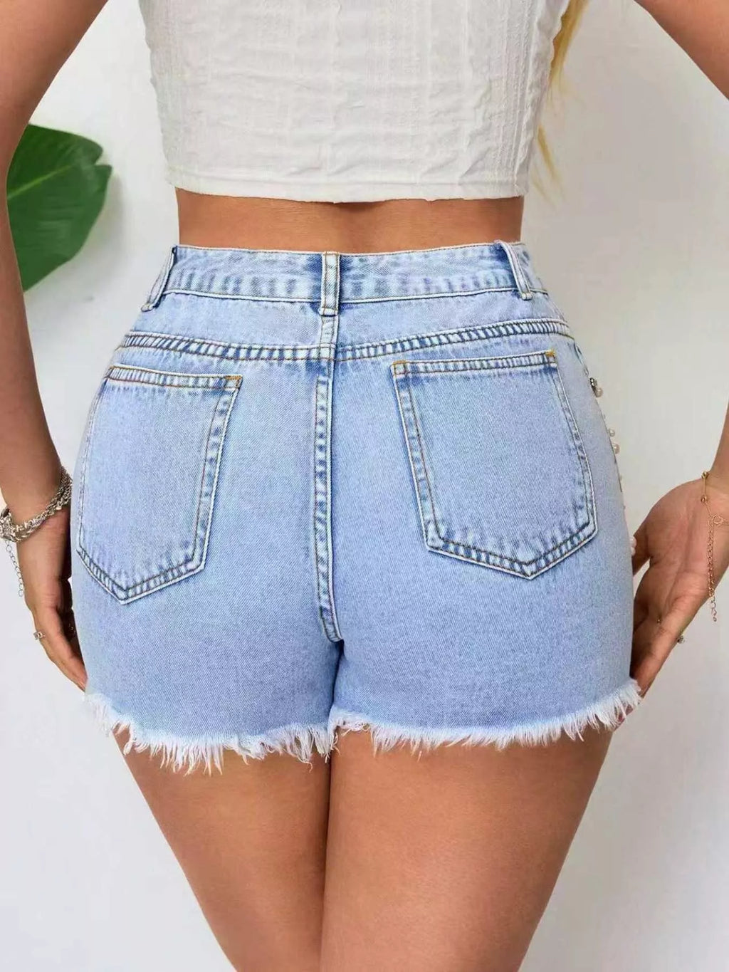 Light Wash Distressed Raw Hem Denim Shorts