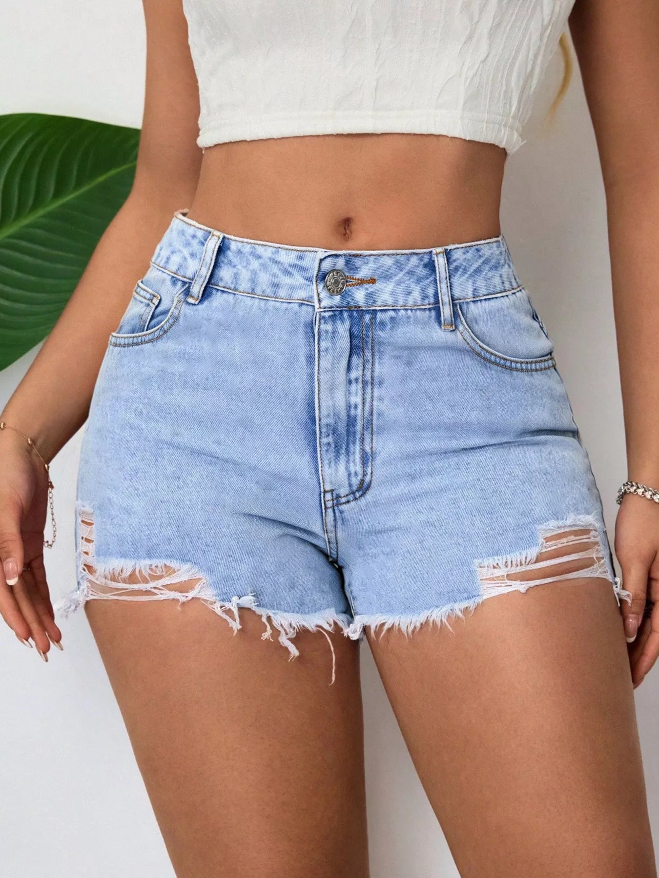 Light Wash Distressed Raw Hem Denim Shorts
