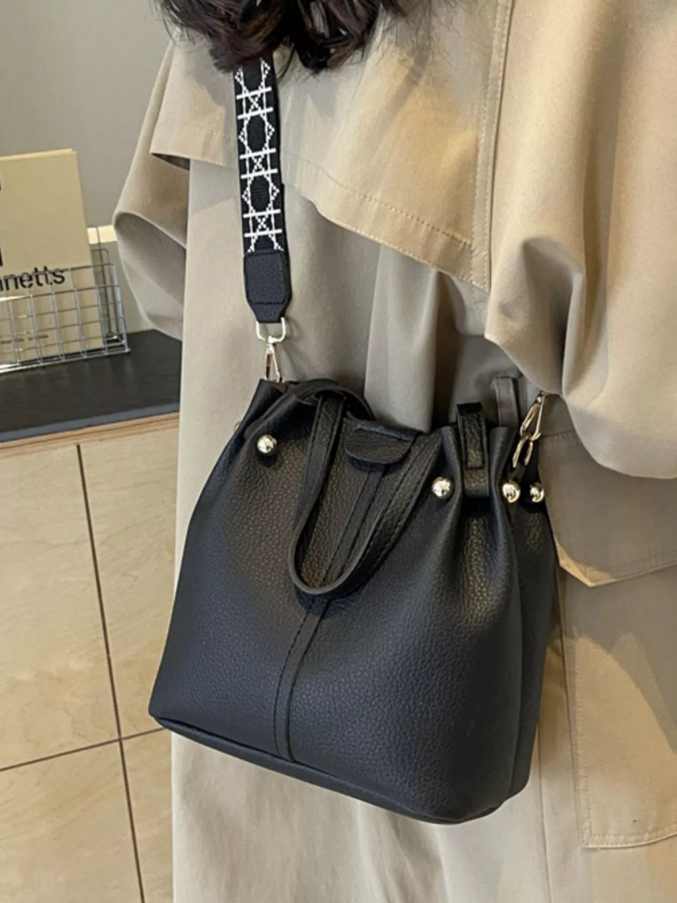 Black PU Leather Bucket Crossbody Bag with Patterned Strap