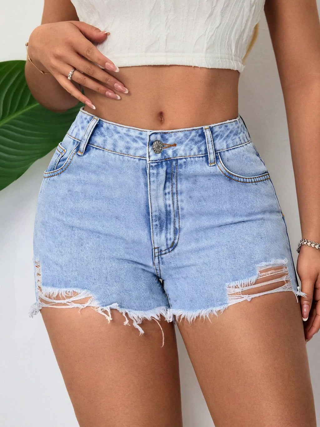 Light Wash Distressed Raw Hem Denim Shorts