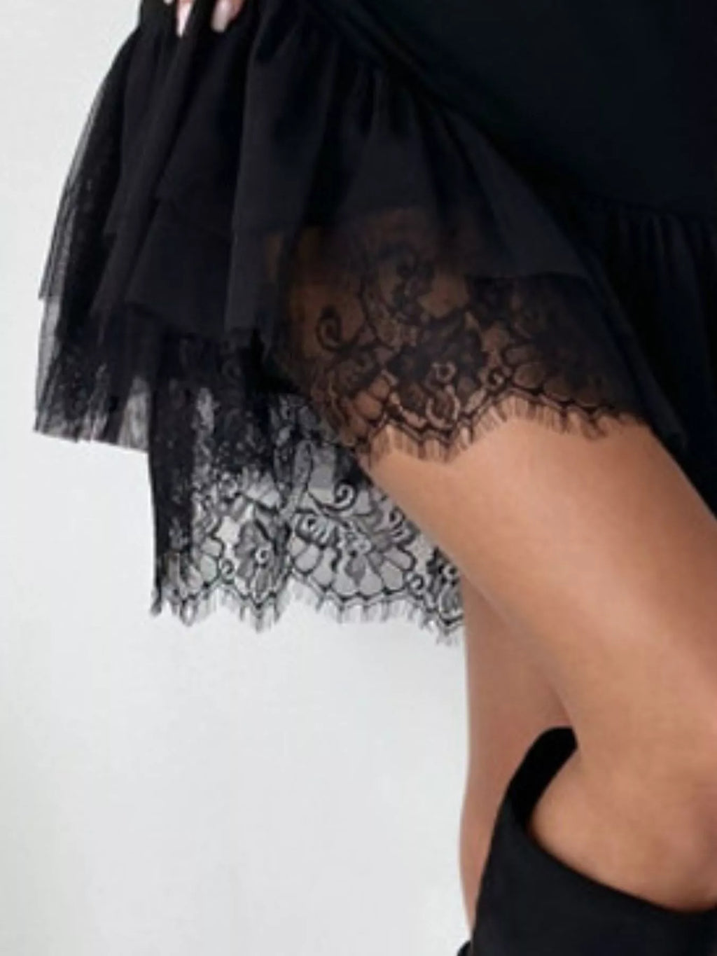 Sleeveless Mini Dress with Tulle Hem and Delicate Lace Detail