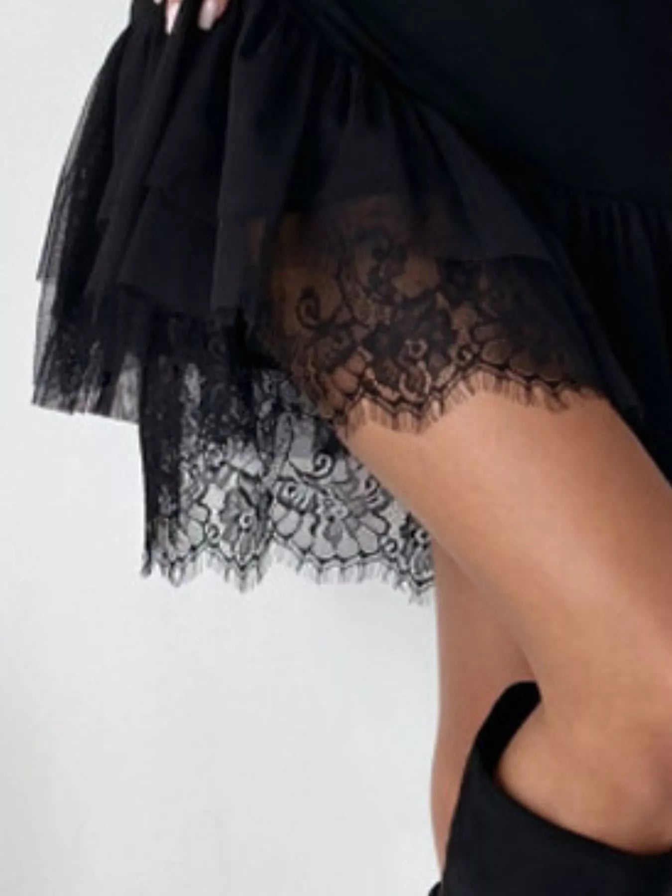 Sleeveless Mini Dress with Tulle Hem and Delicate Lace Detail